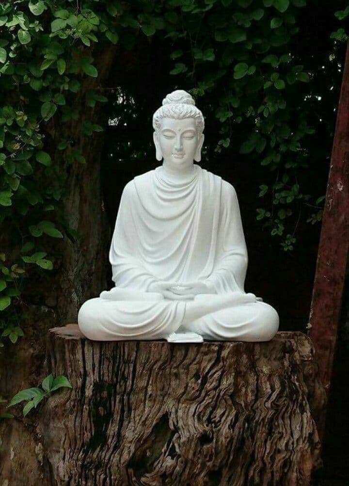 Master sculptor handcrafting sacred marble home decor and Buddha idol
